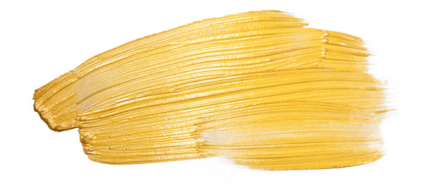 istock Gold acrylic paint brush stroke hand drawing texture isolated on white background top view photo object design 1220188690
