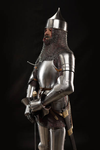 istock Mannequin man with a beard in a helmet and armor of a knight 1220191486