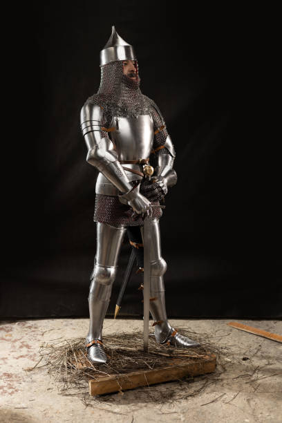 istock Mannequin man with a beard in a helmet and armor of a knight 1220191608