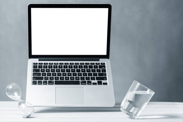 istock Laptop mockup, computer with blank screen flying under the table. Symbol of lightness freshness airiness. Modern technologies social networks and applications. Copy space 1220191616