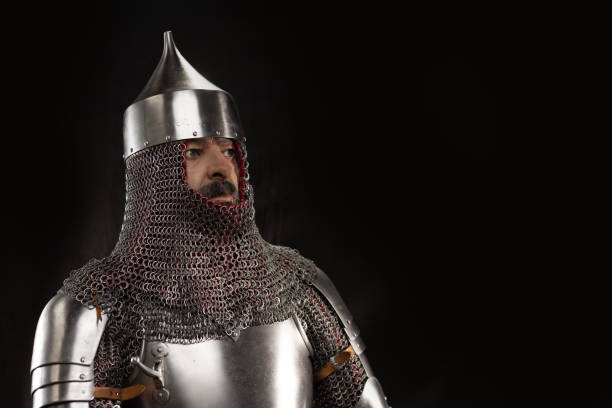 istock Mannequin man with a beard in a helmet and armor of a knight 1220191837
