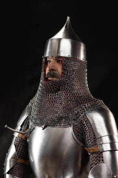 istock Mannequin man with a beard in a helmet and armor of a knight 1220192438