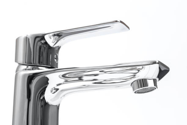 istock Stainless steel faucet isolated on white background 1220192758