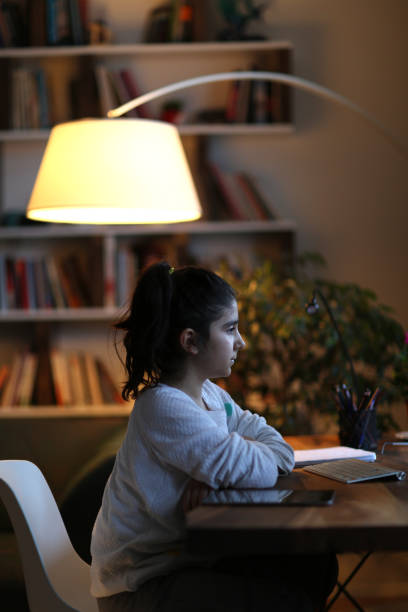 istock Coronavirus Outbreak. Lockdown and school closures. Schoolgirl watching online education class 1220194041