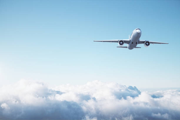istock Passenger airplane flying in the blue sky 1220197504