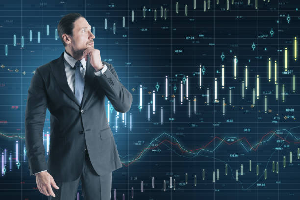 istock Businessman and creative business chart on blue screen 1220197558