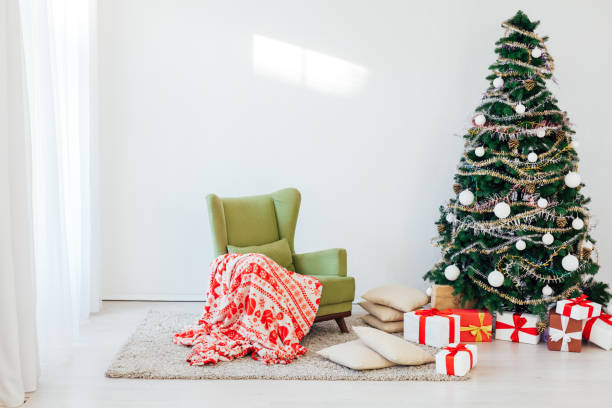 istock Christmas tree gifts winter background holiday new year 1220197574
