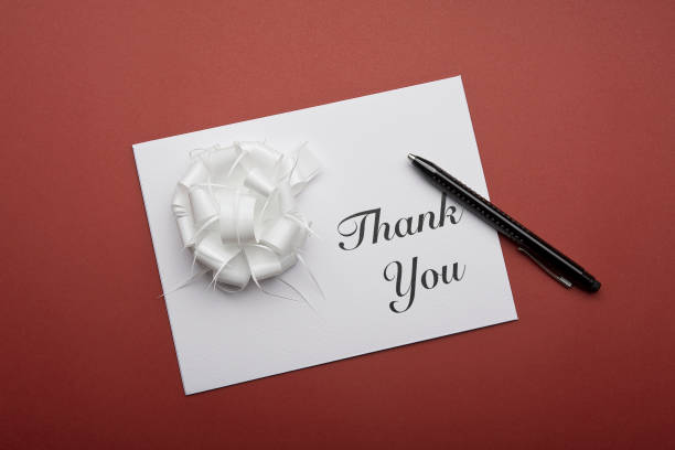 istock Envelope with Thank You Message and white ornament. 1220199085
