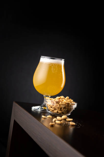 istock Lemon cider and bowl of peanuts 1220199211