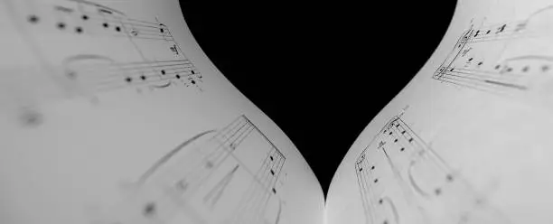 Photo of The black and white concept of the love of music. Foreground soft focus.