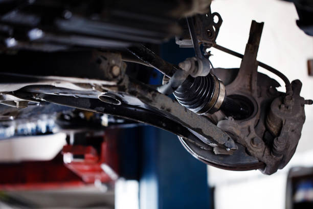 istock The car wheel shaft mechanic has checked and repaired 1220202167