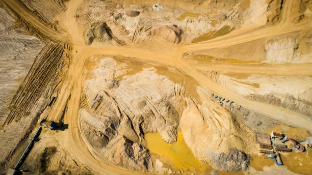 istock Gravel and sand open pit mining, escarpment - aerial view 1220202355