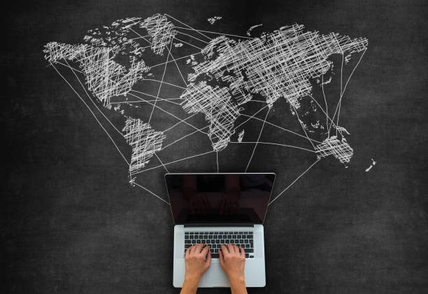 istock Global Business Concept With Laptop On Blackboard 1220211223