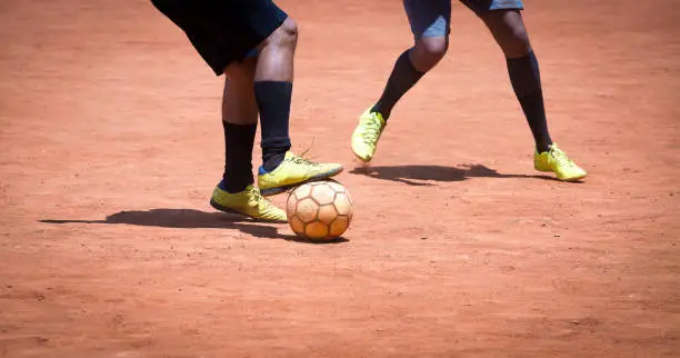 Soccer Amateur-brazilian people playing soccer in a park.