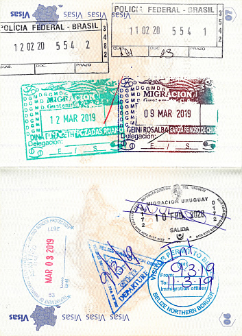 Immigration stamps of Brazil, Guatemala, the United States, Belize and Uruguay in a French passport. No personal data