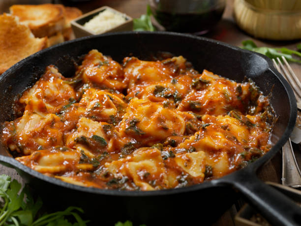 istock Ravioli in a Spinach and Tomato Sauce 1220215502