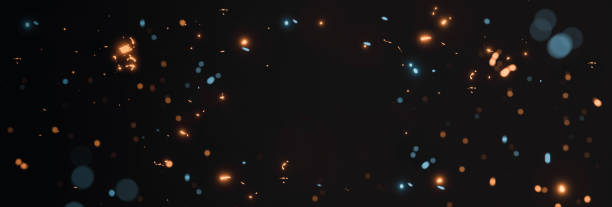 模糊的黃色和青色發光火花從霓虹燈與空白點在黑色背貢 - 粒子 個照片及圖片檔
