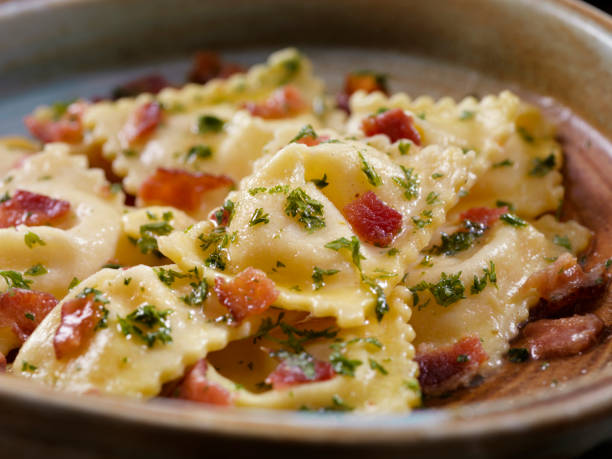 istock Butter Poached Lobster Ravioli with Bacon and Fresh Parsley 1220215616