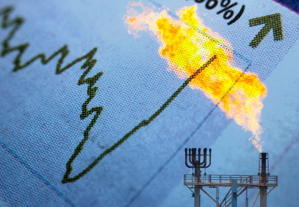 Gas flare on oil platform Stock market chart and industrial -oil and gas - background energy crisis photos stock pictures, royalty-free photos & images