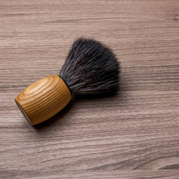 istock Artisan shaving brush on wood background. 1220217894