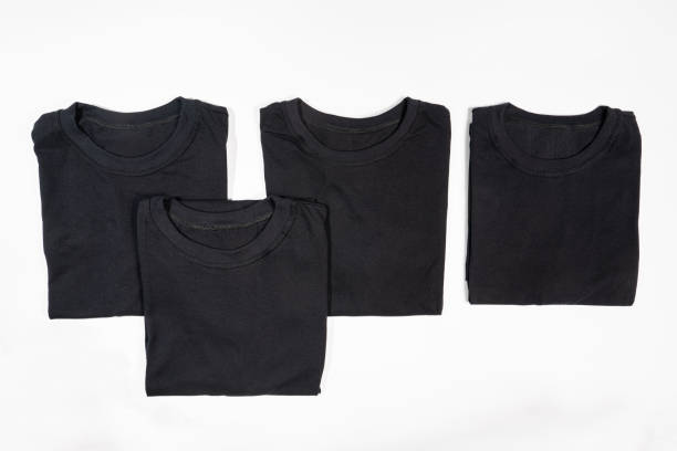 istock black shirt isolated on white 1220221263