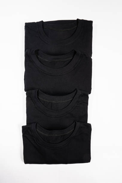 istock black shirt isolated on white 1220221343