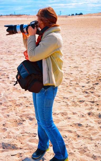 istock Young girl at Ocean shore of Sandy Hook reflex 1220222647