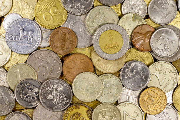 istock Background of various coins from different countries 1220225837