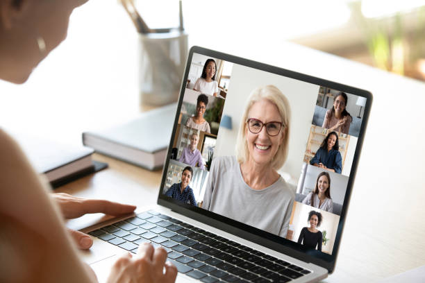 istock Diverse woman involved in group videocall, laptop screen view 1220226067