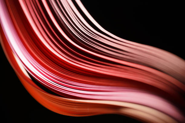 istock Abstract red  gradient color paper strips stacked together in curve shape 1220226356