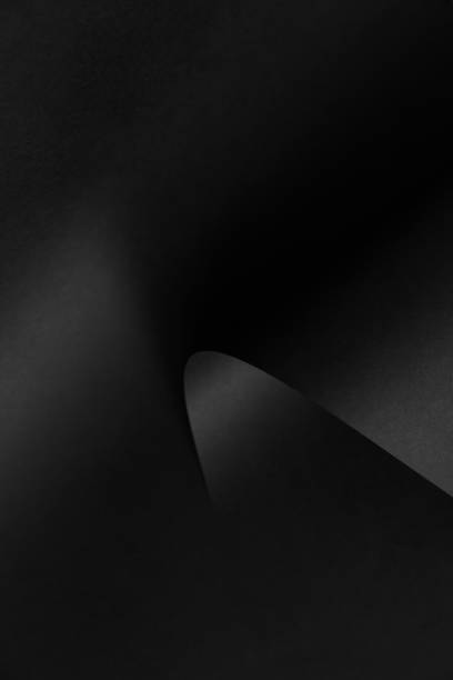 istock Black monochrome paper abstract background design 1220240285