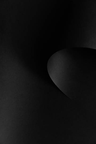 istock Black monochrome paper abstract background design 1220240286