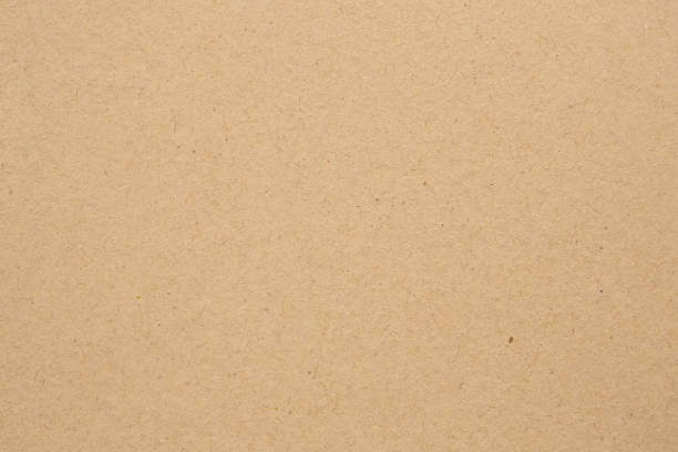 istock Brown eco recycled kraft paper sheet texture cardboard background 1220240450