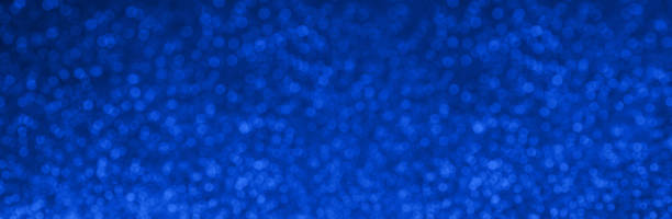 istock Blue Glitter abstract background with bokeh 1220240483