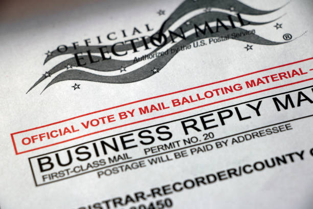 Closeup of Vote by Mail envelope Closeup of a Vote by Mail envelope, official balloting material - business reply mail, USPS first class mail. absentee ballot photos stock pictures, royalty-free photos & images