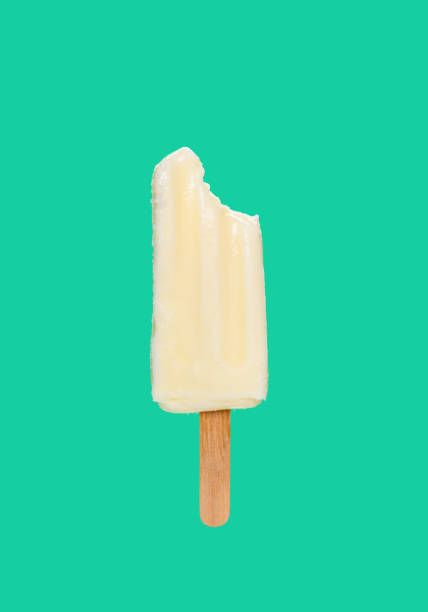 istock milk shake popsicle with a bite on a green background 1220250368