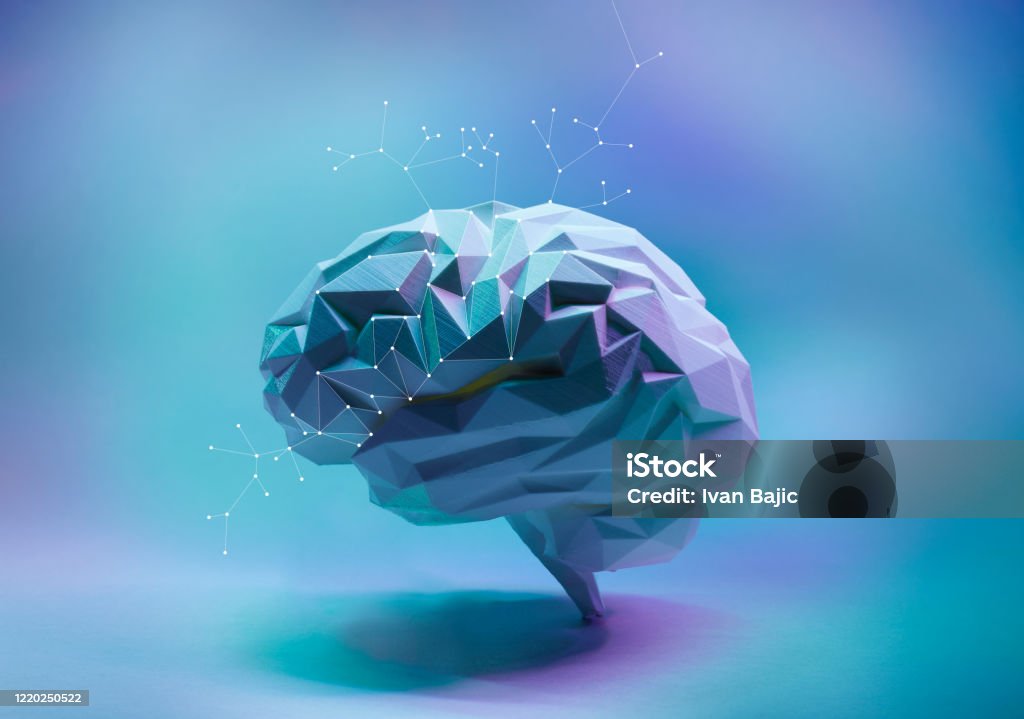 Artificial Intelligence Concept Colorful blue and pink low poly side view human brain with connection dots. Concept of artificial intelligence and machine learning. Three Dimensional Stock Photo