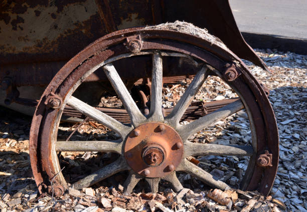 istock Rusted wheel with wooden spokes 1220256441