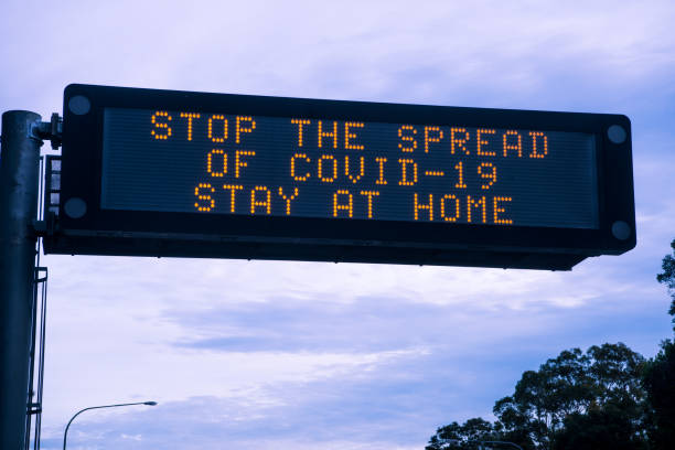 istock Stop The Spread Street Sign 1220261419