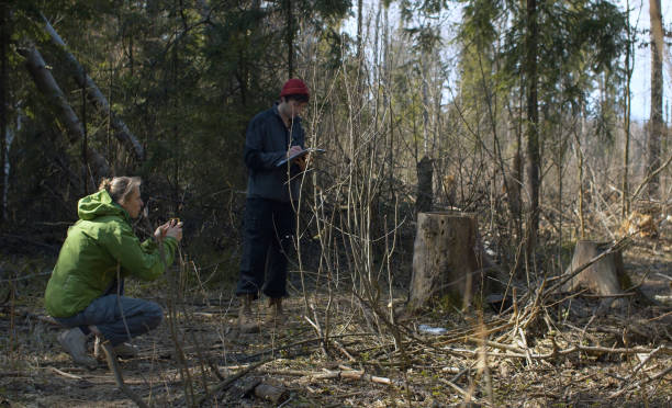 istock Two eco activists in the forest 1220266955