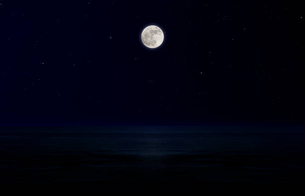 istock Full moon rising over the sea. 1220269233