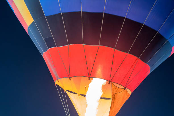 istock colorful Hot air balloon ready for take off in sky in night. Freedom concept. 1220272995