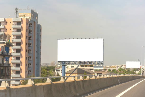 istock billboard blank on road in city for advertising background 1220273031