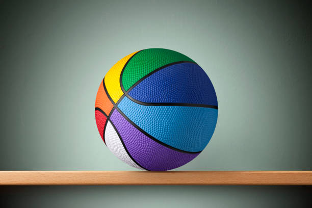 istock Multi-coloured basketball ball on the shelf 1220274455