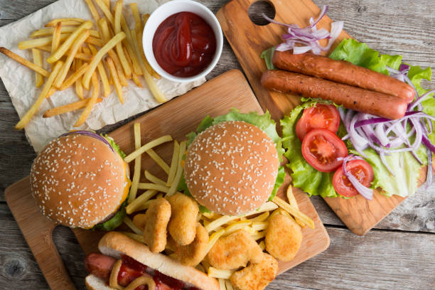 istock Fast food on the wood 1220278068