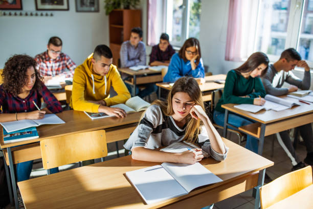 istock Large group of students during a class in the classroom. 1220278885