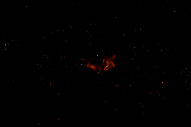 istock fire flames with sparks on black background 1220279344