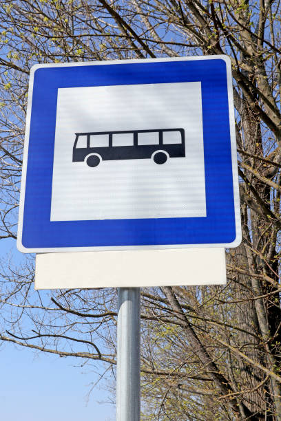 istock Bus stop road sign in front of a tree 1220280567