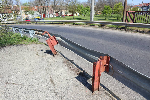 istock Damaged guard rail next to the road 1220280782