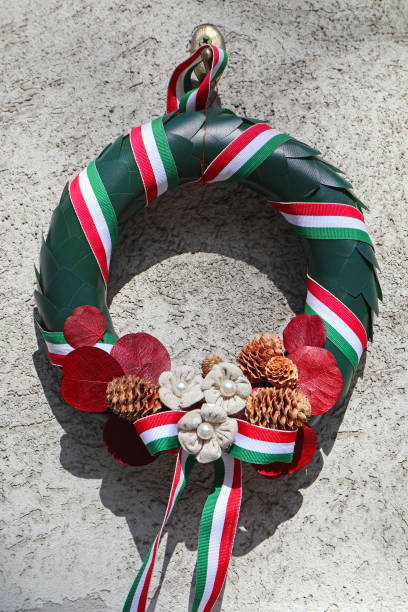 istock Wreath on the wall of a building 1220280850